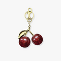 Cherry | Llavero color oro ciruelas